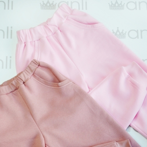 Объемные брюки с начесом нежно-розового цвета