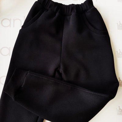 Объемные брюки с начесом черного цвета